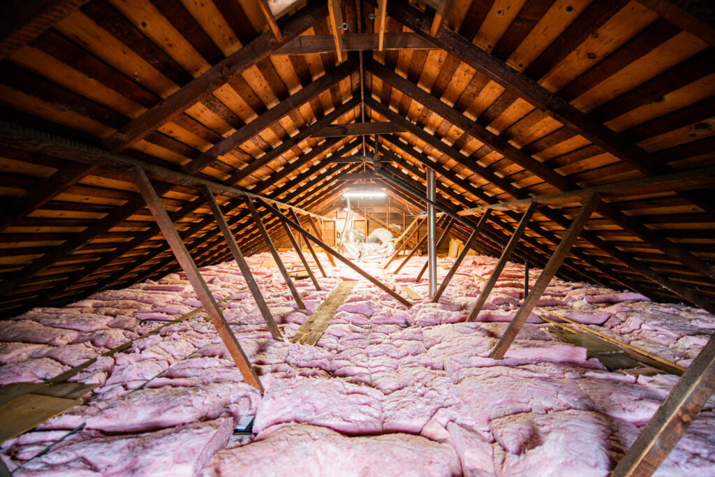 clean attic with new insulation and decontaminated by Attic Construction