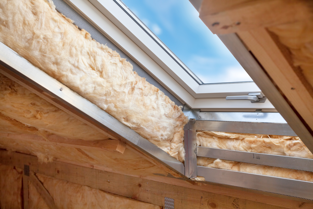 Attic insulation around a skylight
